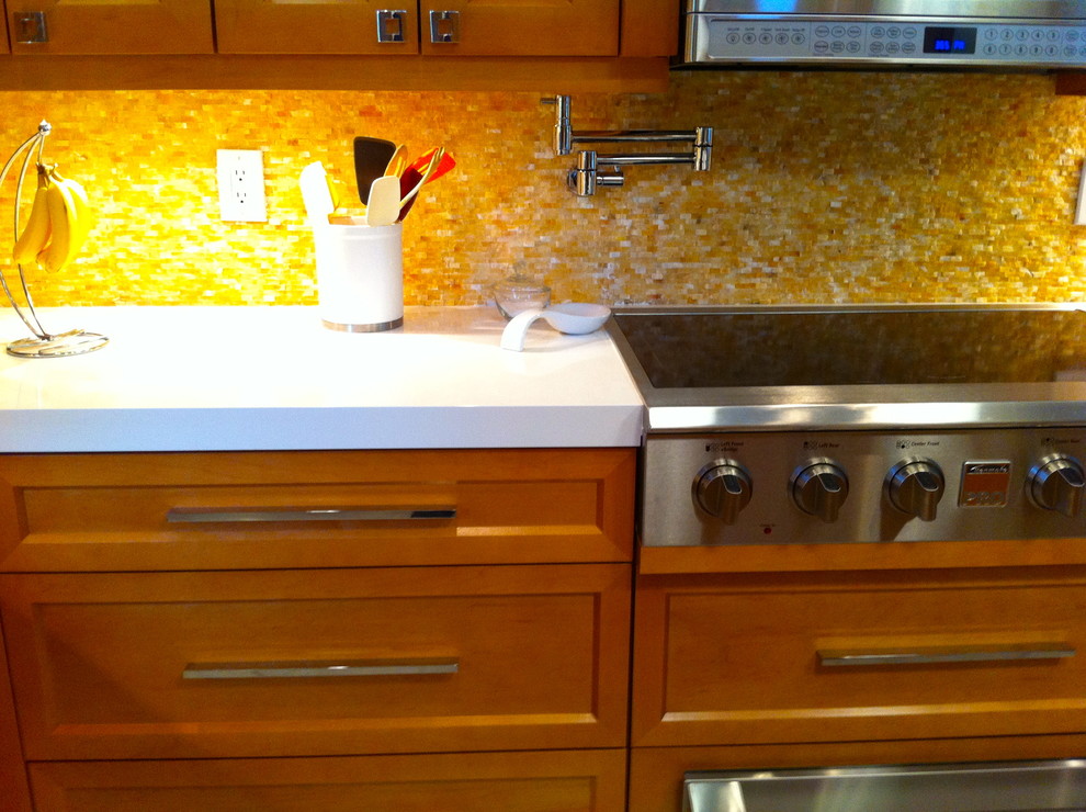 Large transitional u-shaped ceramic tile and beige floor open concept kitchen photo in Miami with a double-bowl sink, shaker cabinets, quartzite countertops, multicolored backsplash, stone tile backsplash, stainless steel appliances, an island and medium tone wood cabinets