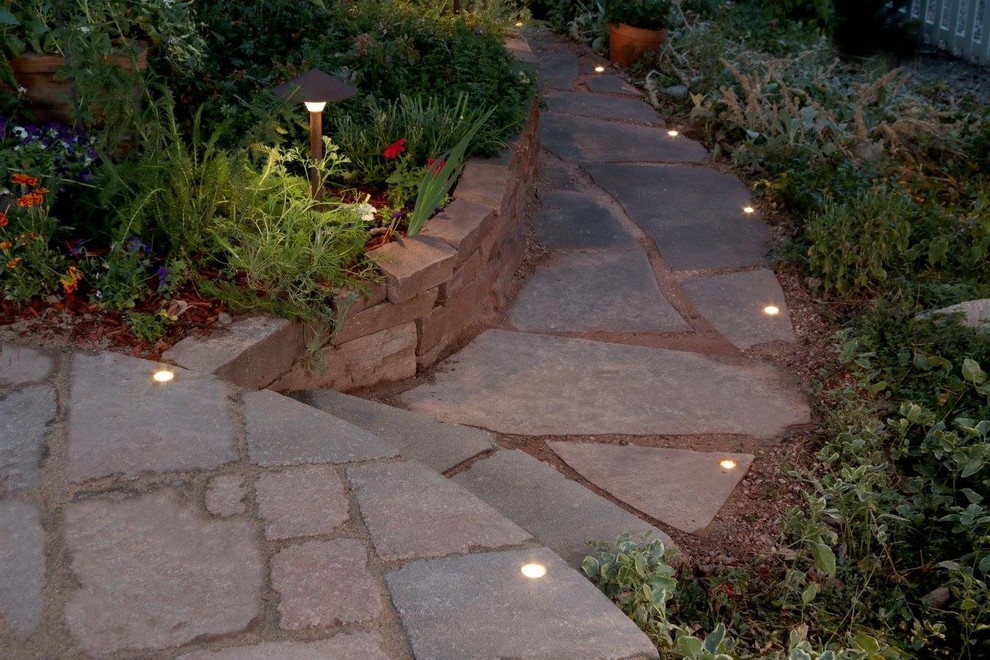 Inspiration for a small contemporary backyard formal garden in Denver with a garden path and natural stone pavers.