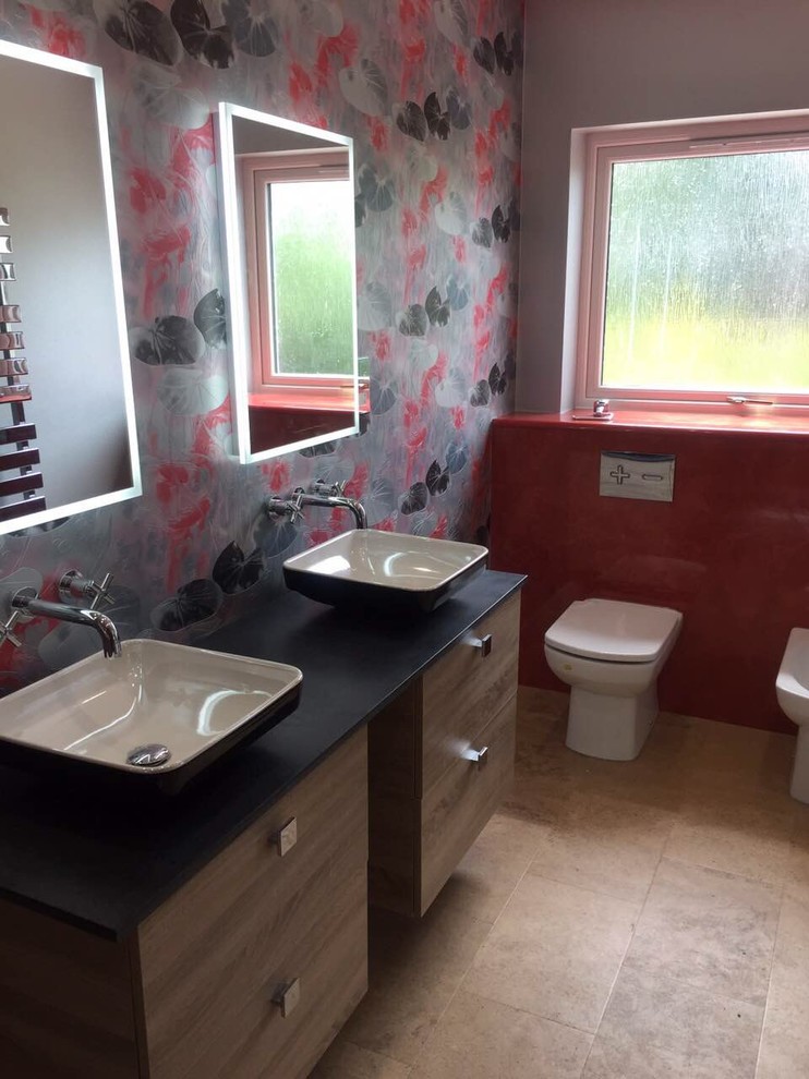 Small contemporary master bathroom in Other with flat-panel cabinets, light wood cabinets, an open shower, a one-piece toilet, orange walls, vinyl floors, a vessel sink, solid surface benchtops, beige floor and a hinged shower door.