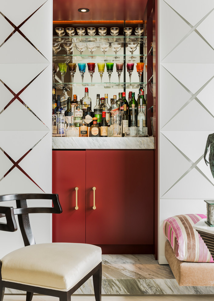 Mid-sized contemporary home bar in Boston with flat-panel cabinets, red cabinets, marble benchtops and mirror splashback.