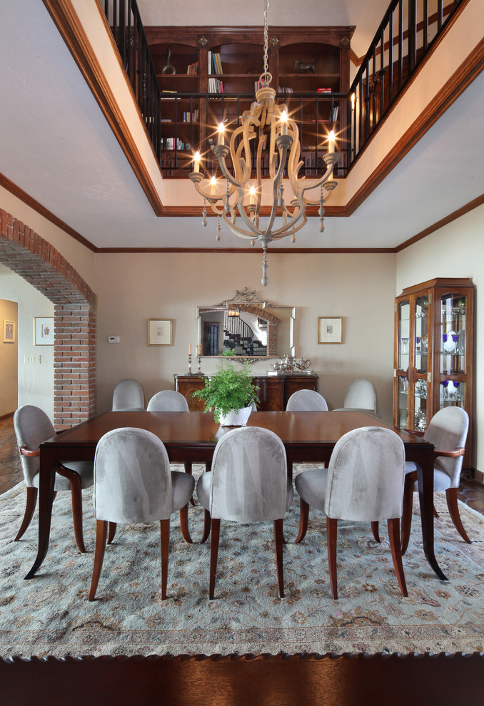 Design ideas for a mid-sized traditional dining room in Orange County with beige walls, dark hardwood floors and no fireplace.
