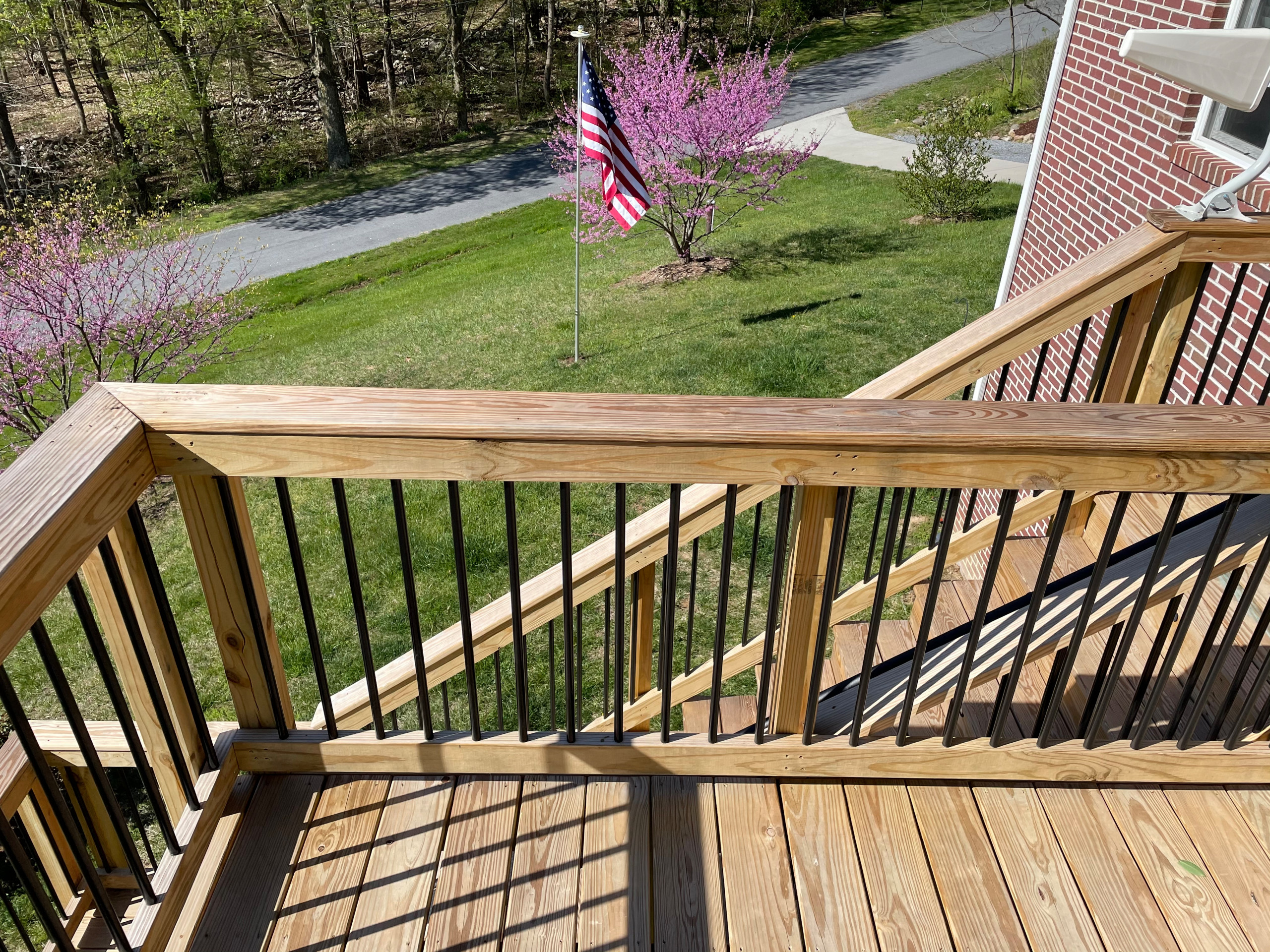 Deck stain and gutters powerwash