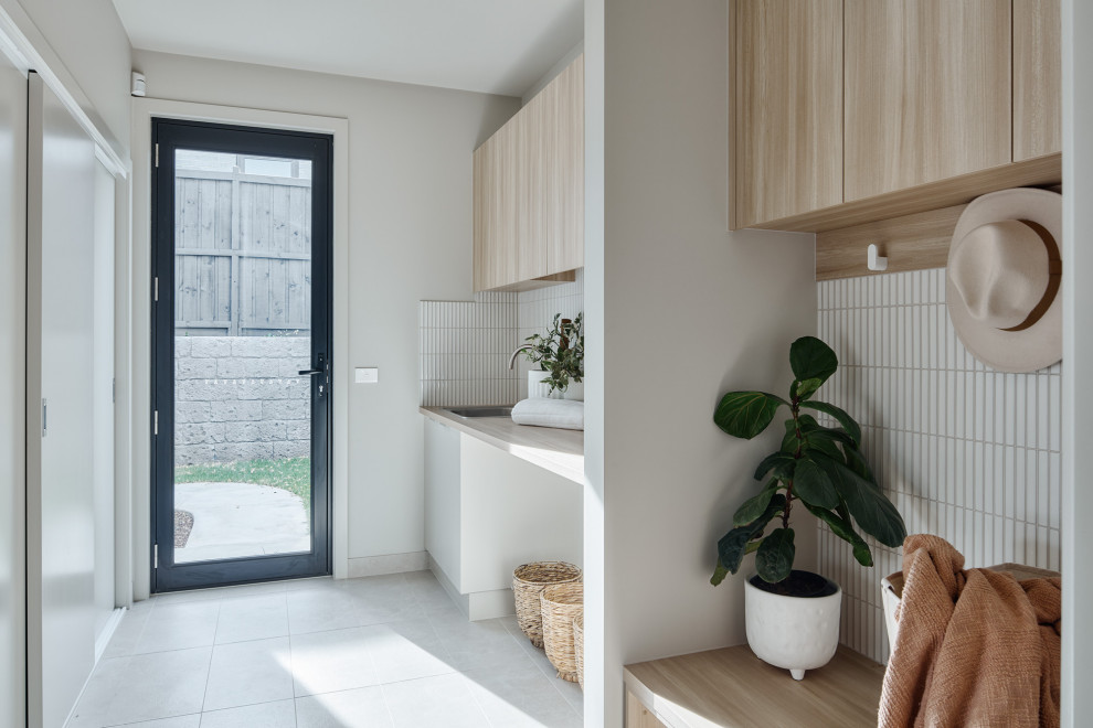Photo of a contemporary laundry room in Other.