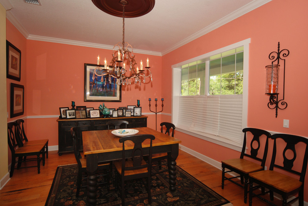 Photo of a tropical dining room in Tampa.