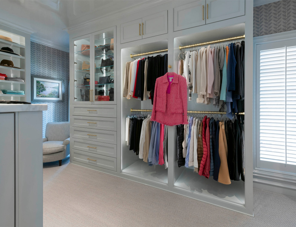 Design ideas for a medium sized classic walk-in wardrobe for women in Dallas with beaded cabinets, grey cabinets, carpet and grey floors.