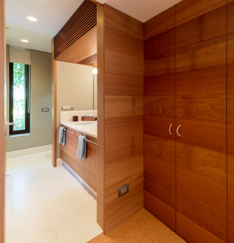 This is an example of an expansive modern sauna bathroom in Cagliari with mosaic tiles and mosaic tile flooring.