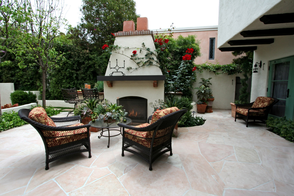 Inspiration for a traditional patio in San Diego with a fire feature.
