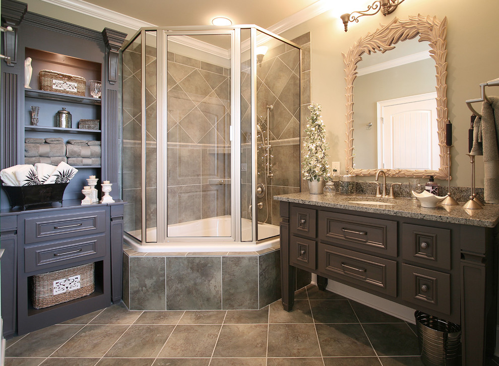 Photo of a bathroom in Charlotte with a corner tub, granite benchtops and a shower/bathtub combo.