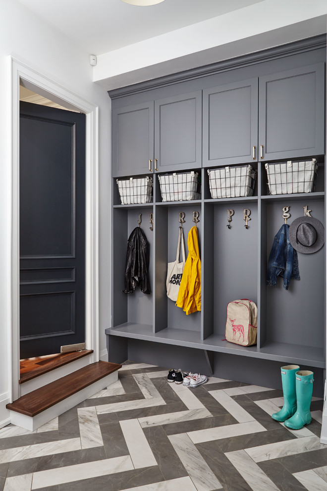 Transitional mudroom in Toronto with white walls, porcelain floors, a single front door, a gray front door and grey floor.
