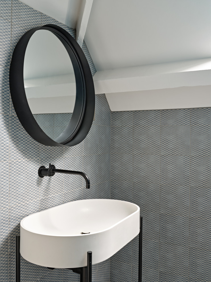 This is an example of a contemporary cloakroom in Other.