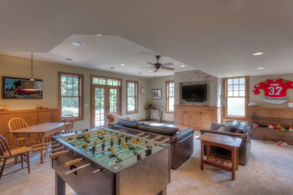 Basement - rustic walk-out carpeted basement idea with beige walls