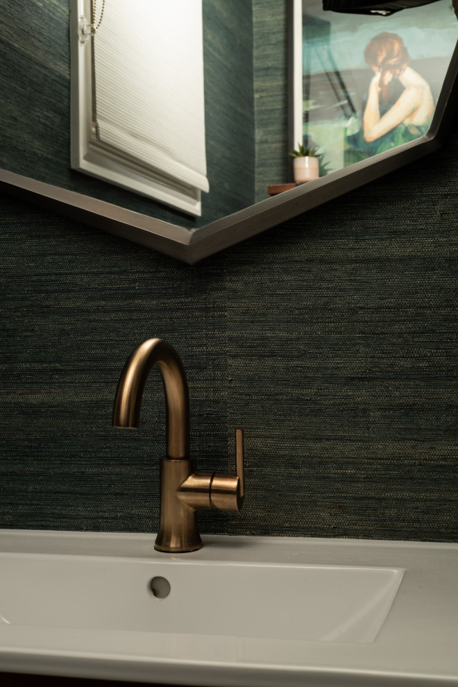 Example of a small transitional wallpaper powder room design in Chicago with flat-panel cabinets, medium tone wood cabinets, green walls, an integrated sink, white countertops, a freestanding vanity and quartz countertops