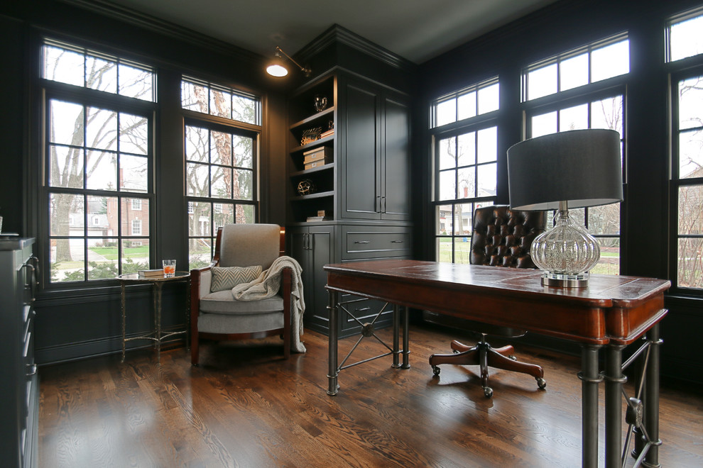 Mid-sized traditional study room in Chicago with grey walls, medium hardwood floors and a freestanding desk.