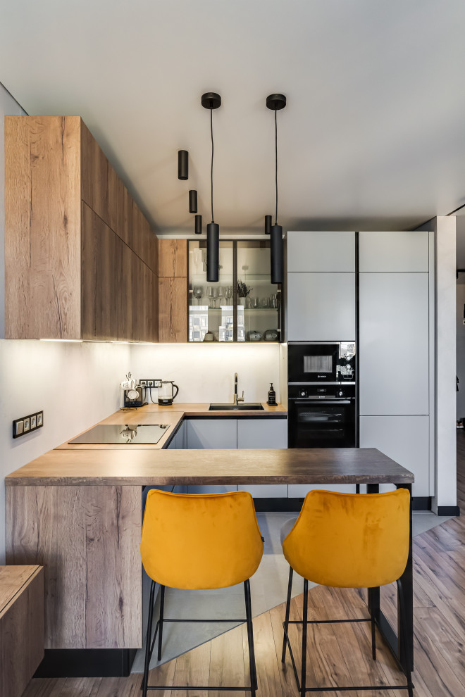 Угловая кухня совмещенная с гостиной