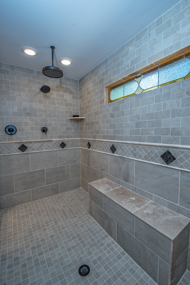Design ideas for a mid-sized traditional master bathroom in Other with granite benchtops, raised-panel cabinets, light wood cabinets, a double shower, a two-piece toilet, beige tile, porcelain tile, brown walls, porcelain floors and an undermount sink.