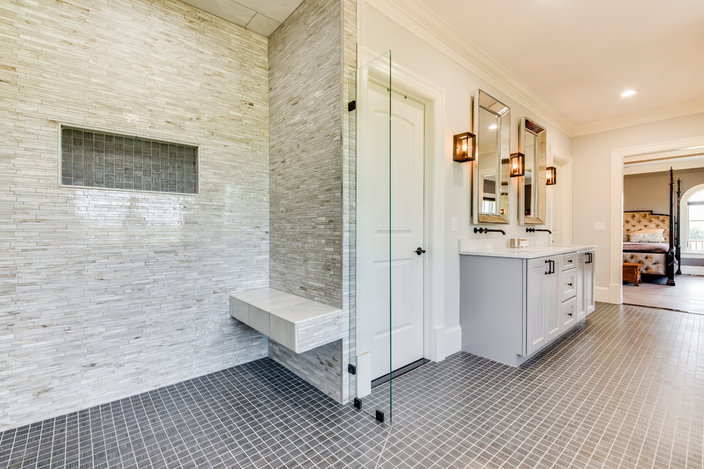 Inspiration for a large transitional master bathroom in Other with a two-piece toilet, white walls, an undermount sink, a hinged shower door, recessed-panel cabinets, grey cabinets, a freestanding tub, an open shower, beige tile, brown tile, gray tile, white tile, matchstick tile, porcelain floors, brown floor and white benchtops.