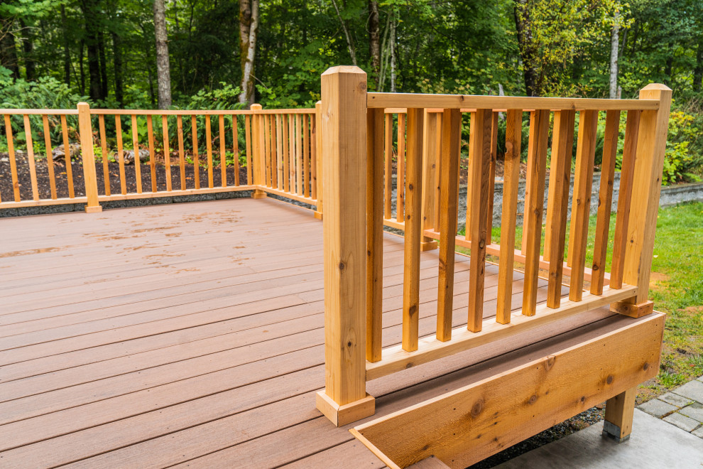 Deck - mid-sized backyard deck idea in Seattle