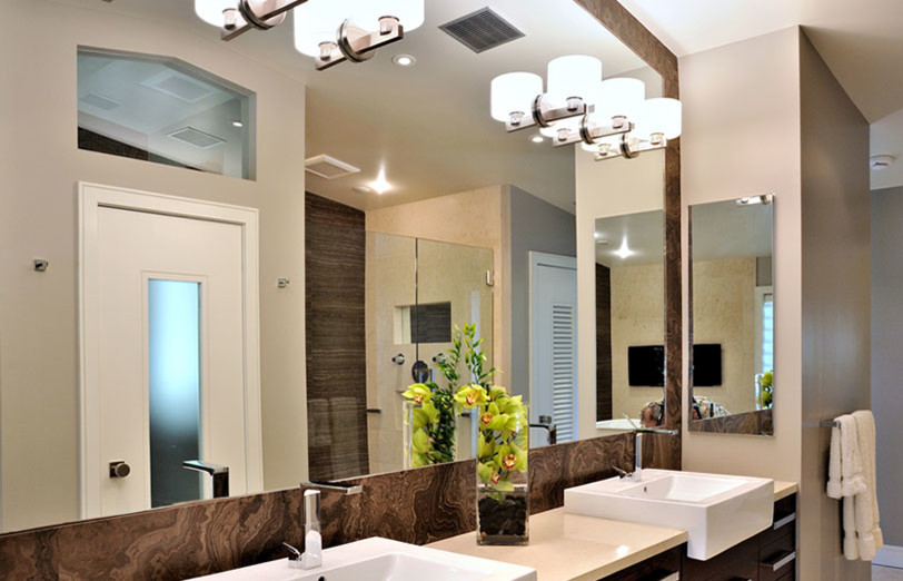 This is an example of a large contemporary master bathroom in Miami with flat-panel cabinets, beige walls and a vessel sink.