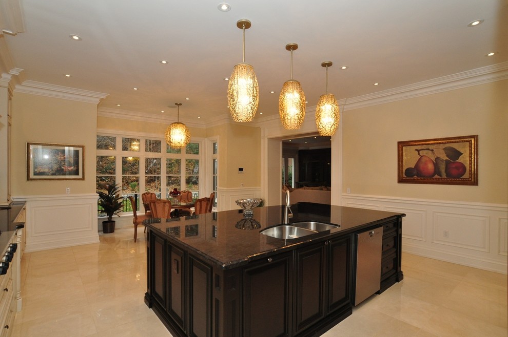 Example of a transitional kitchen design in Toronto