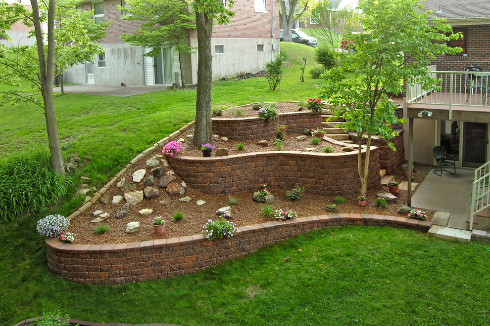 This is an example of a rustic hillside retaining wall landscape.
