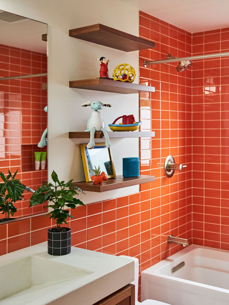 Design ideas for a mid-sized modern kids bathroom in Portland with flat-panel cabinets, medium wood cabinets, a shower/bathtub combo, orange tile, ceramic tile, engineered quartz benchtops, a shower curtain, a double vanity and a floating vanity.