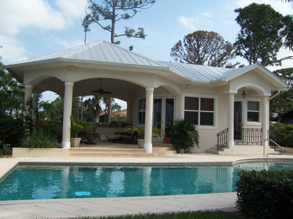 This is an example of a beach style exterior in Miami.