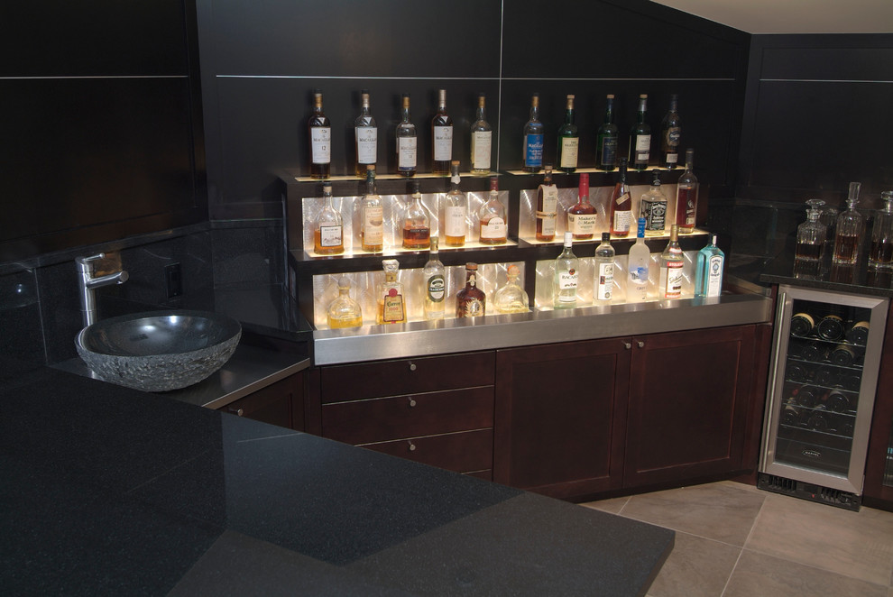 This is an example of a contemporary family room in Denver with a home bar and porcelain floors.