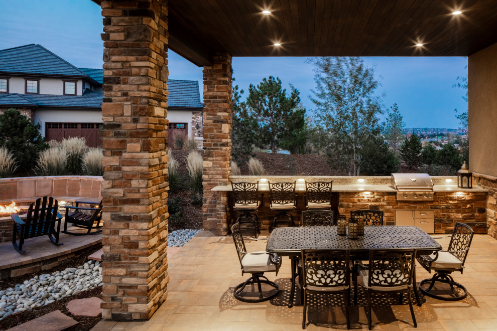 Mountain style home design photo in Denver