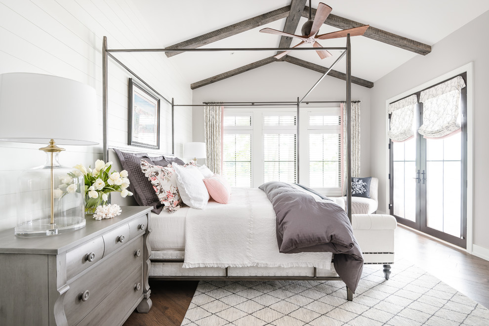 Inspiration for a country master bedroom in Columbus with grey walls, dark hardwood floors and brown floor.