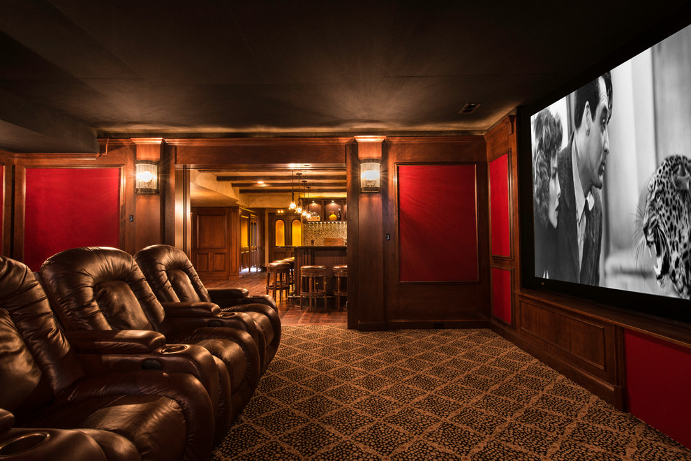 Inspiration for a mid-sized traditional enclosed home theatre in DC Metro with carpet, a projector screen, red walls and multi-coloured floor.