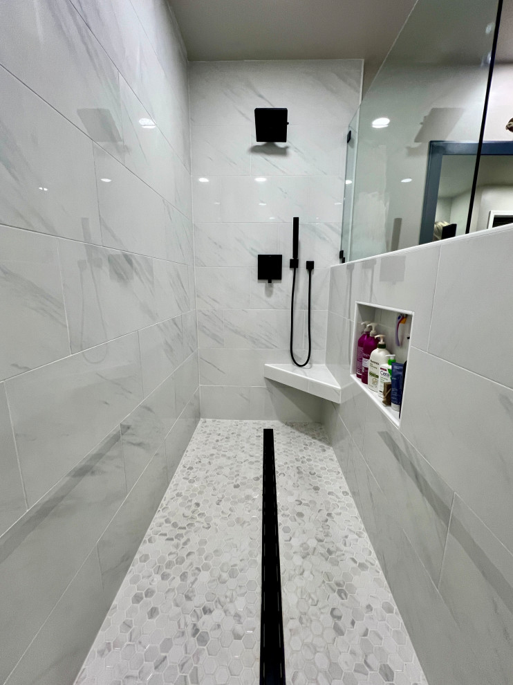 This is an example of a large modern bathroom in Other with a curbless shower, white tile, porcelain tile, white walls, mosaic tile floors, tile benchtops, white floor, an open shower, white benchtops and a shower seat.