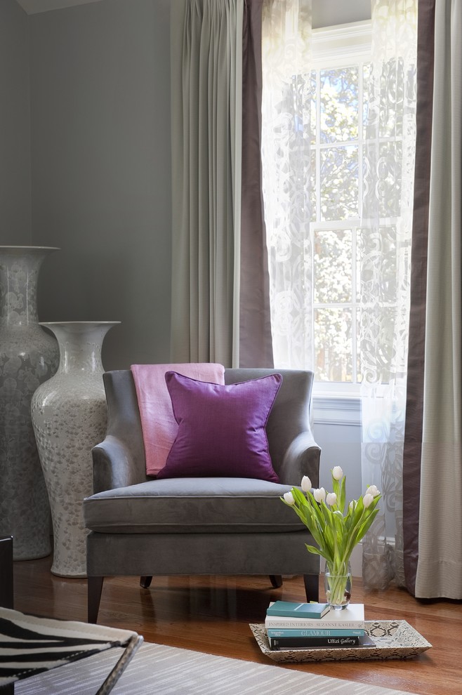 Classic Contemporary Reading Corner - A classic, elegant master suite for the husband and wife, and a fun, sophisticated entertainment space for their family -- it was a dream project!

To turn the master suite into a luxury retreat for two young executives, we mixed rich textures with a playful, yet regal color palette of purples, grays, yellows and ivories. 

For fun family gatherings, where both children and adults are encouraged to play, I envisioned a handsome billiard room and bar, inspired by the husband’s favorite pub.