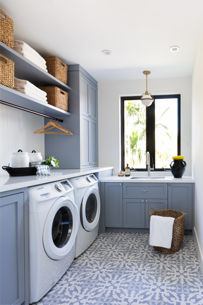 Photo of a transitional laundry room in Miami.