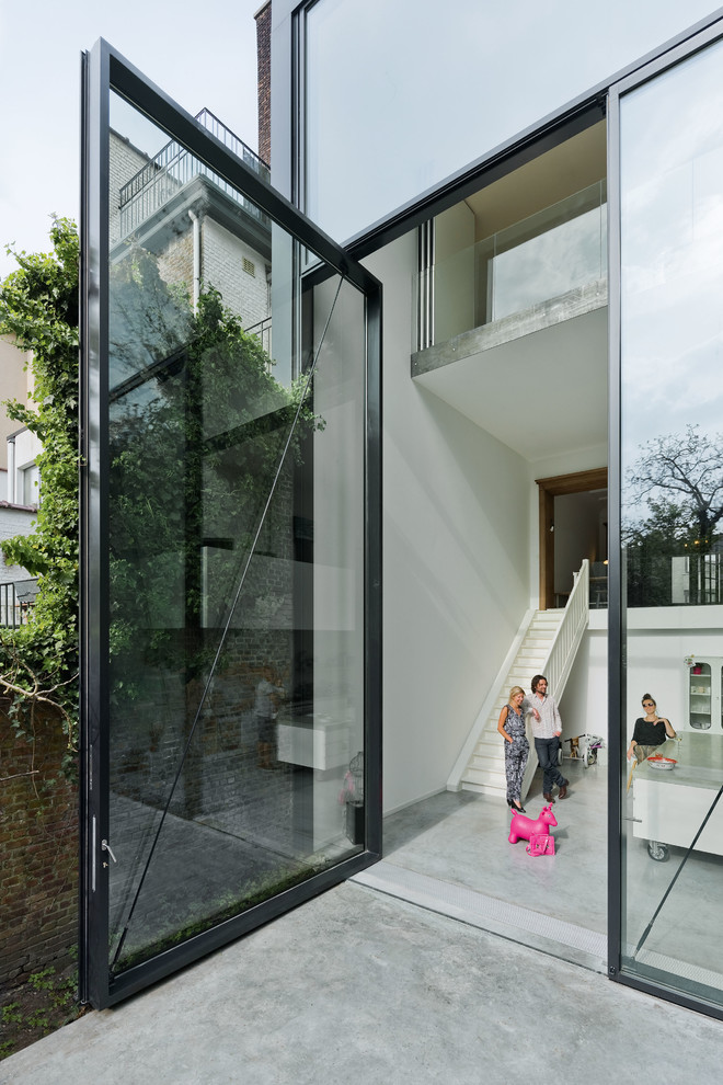 Photo of a modern glass townhouse exterior in Stockholm.