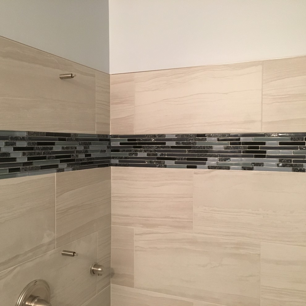 Small transitional master bathroom in Baltimore with recessed-panel cabinets, blue cabinets, an alcove shower, a one-piece toilet, white tile, ceramic tile, grey walls, porcelain floors, an undermount sink, granite benchtops, white floor and a sliding shower screen.