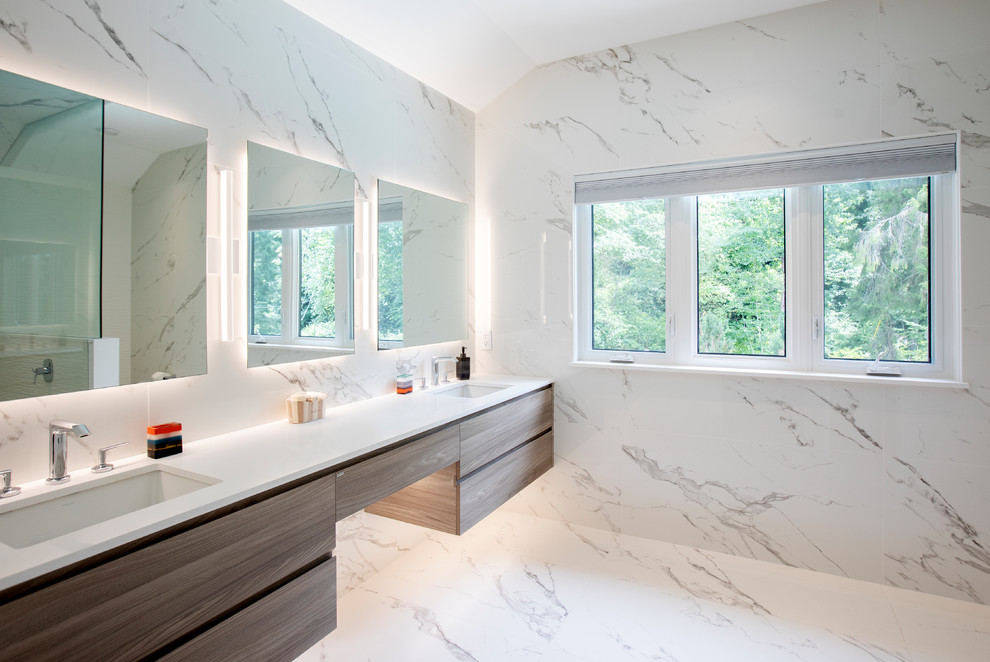 Mid-sized contemporary master bathroom in Vancouver with louvered cabinets, medium wood cabinets, a corner shower, a one-piece toilet, white tile, ceramic tile, white walls, ceramic floors, an undermount sink, white floor, a hinged shower door and white benchtops.
