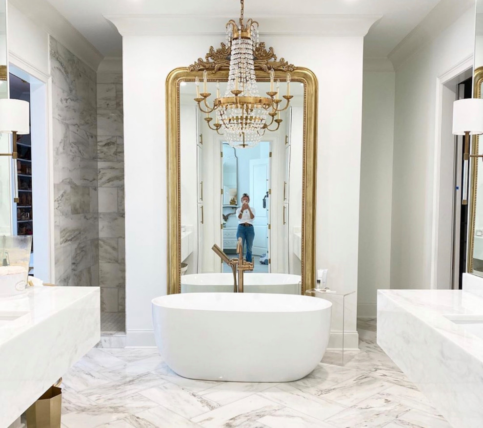 Inspiration for a large master bathroom in New Orleans with a freestanding tub, white walls, white benchtops, a double vanity and a floating vanity.