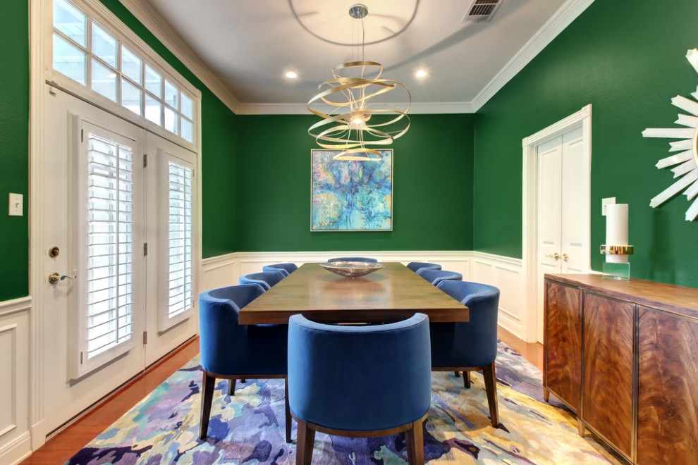Example of a mid-sized transitional dining room design in Austin