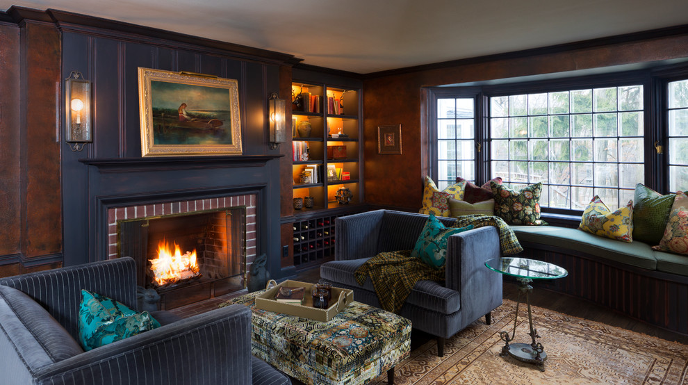 Inspiration for a small traditional enclosed family room in Milwaukee with a library, brown walls, dark hardwood floors, a standard fireplace, a brick fireplace surround and brown floor.