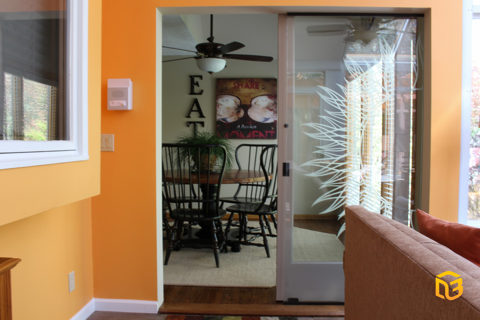 Kitchen - transitional medium tone wood floor kitchen idea in Omaha with distressed cabinets and an island