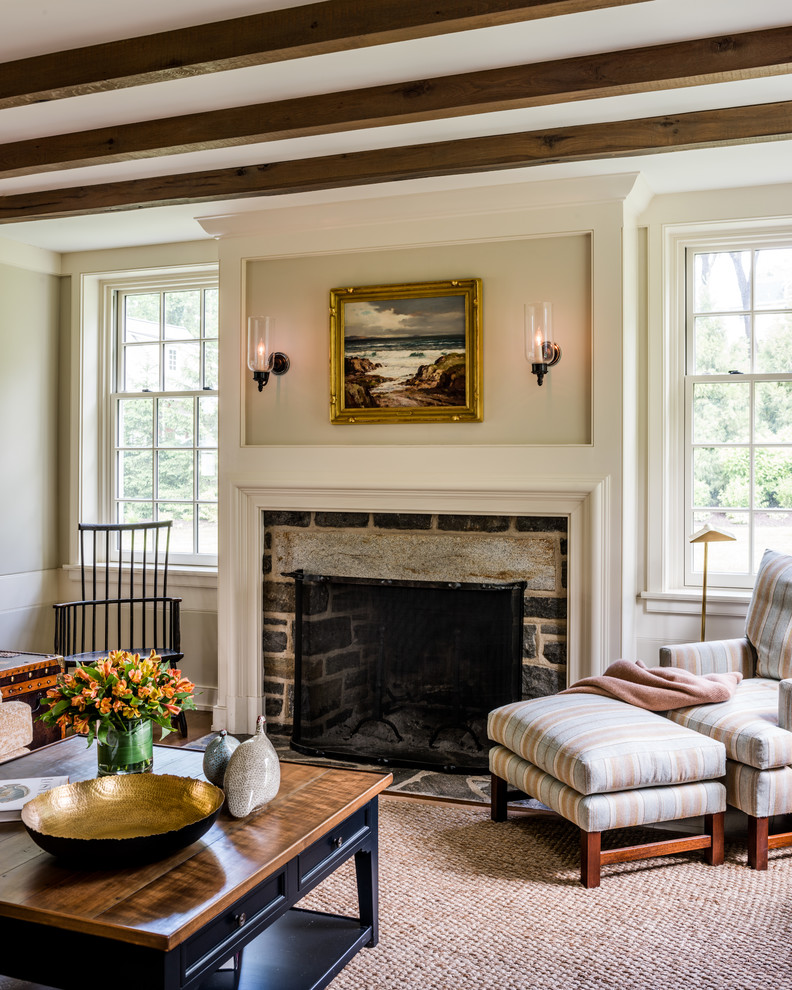 Example of a large farmhouse open concept medium tone wood floor and brown floor family room library design in Philadelphia with beige walls, a standard fireplace, a stone fireplace and no tv