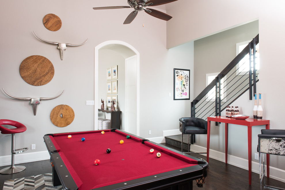 Photo of an expansive contemporary family room in Dallas with a game room, beige walls and dark hardwood floors.