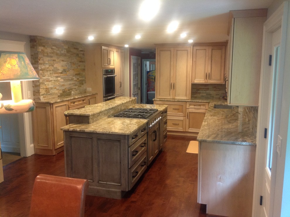 Mountain style home design photo with granite countertops