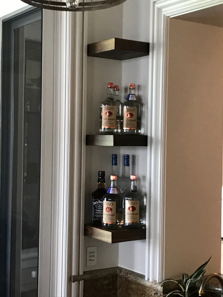 Photo of a modern home bar in Miami.