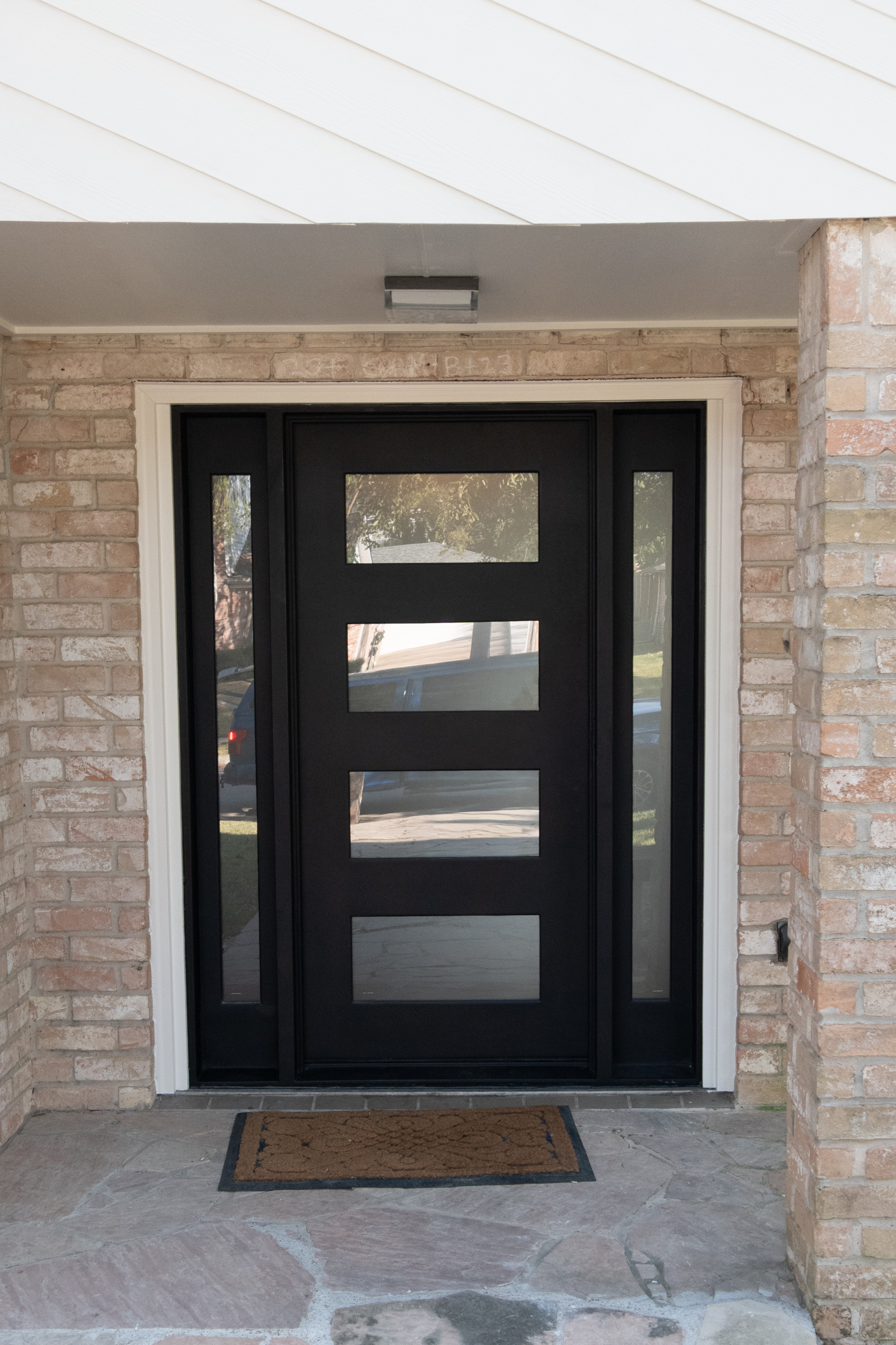 This modern home in Houston’s Energy Corridor was designed with clean lines and bold geometry — a true reflection of contemporary style. When the homeowner noticed water intrusion around the aging fro
