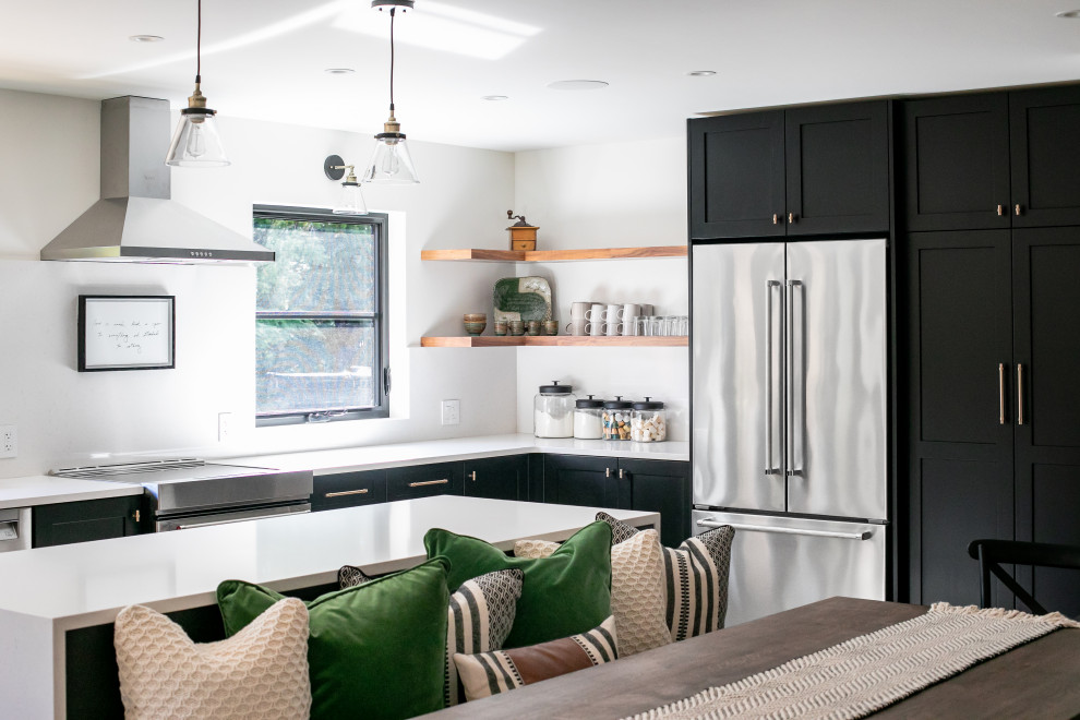 Example of a transitional kitchen design in Vancouver