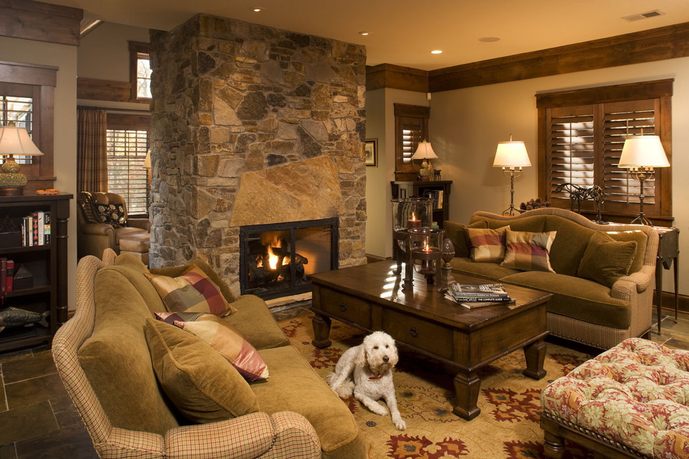 Inspiration for a country living room in Minneapolis with a stone fireplace surround.