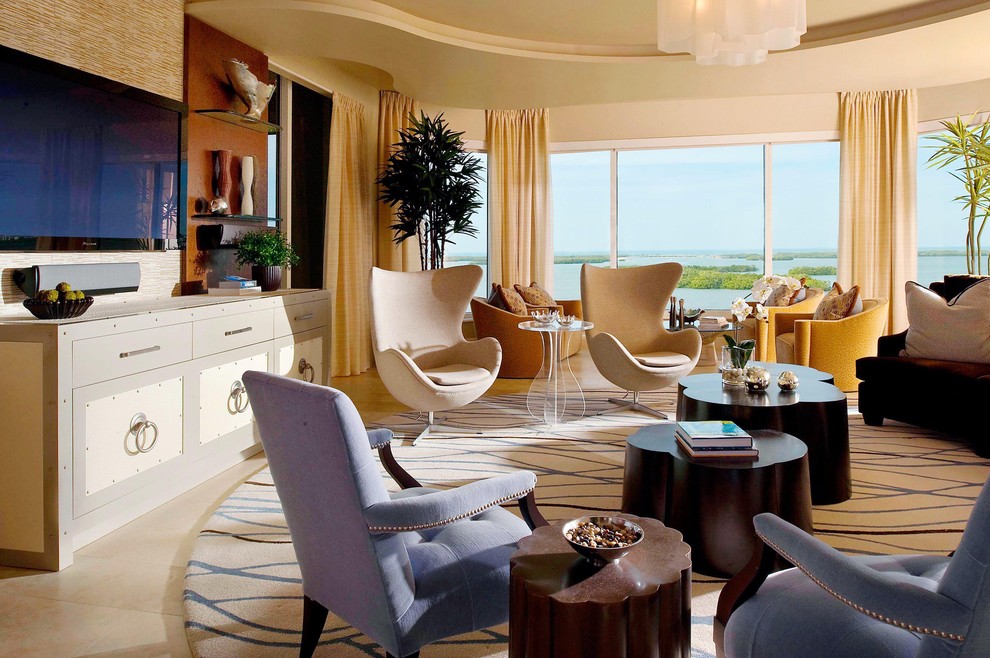 Design ideas for a mid-sized transitional living room in Miami with beige walls and a wall-mounted tv.