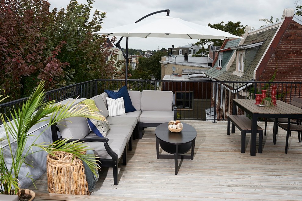 Photo of a large transitional rooftop deck in DC Metro with no cover.