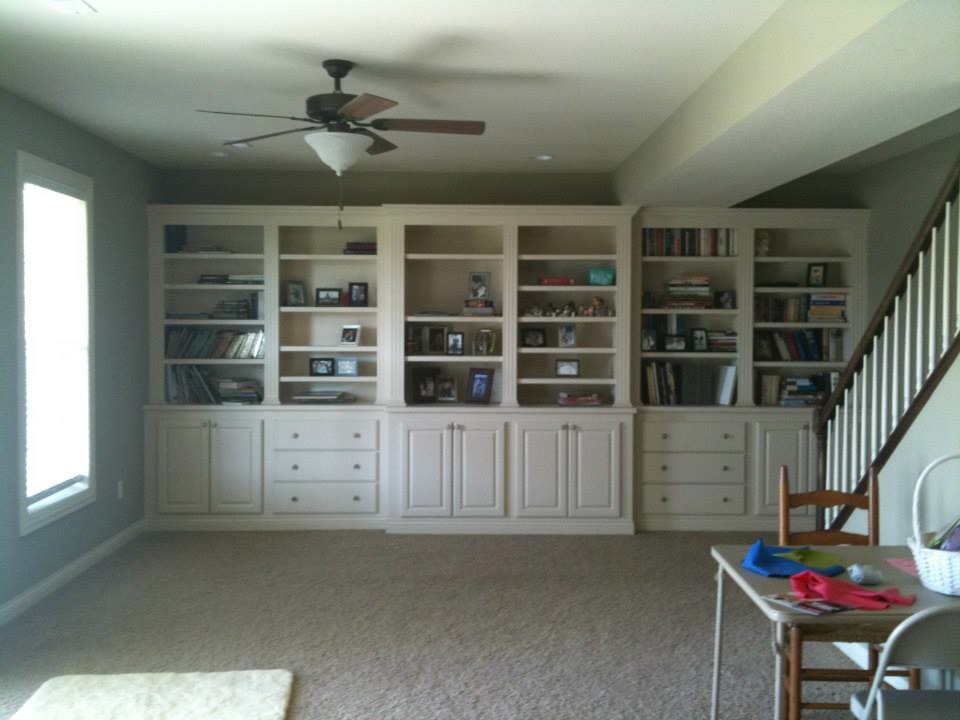 Inspiration for a carpeted living room remodel with beige walls, no fireplace and no tv